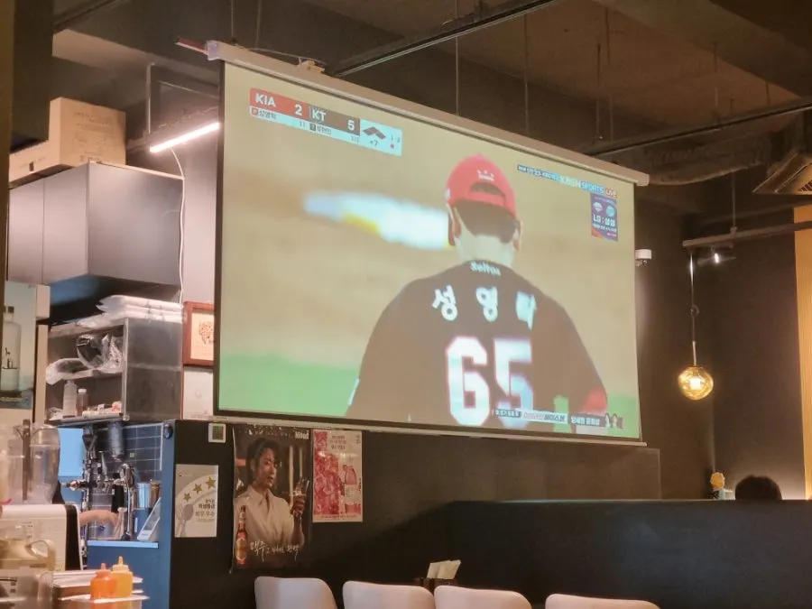 Chicken restaurant hall with a huge screen