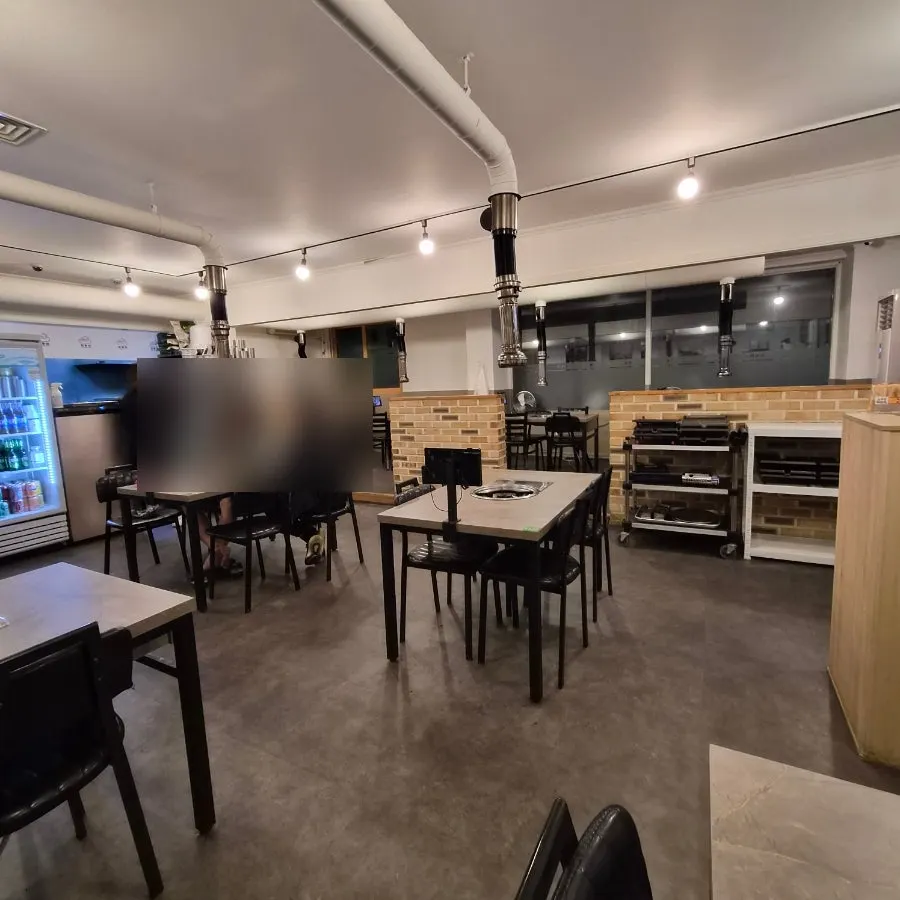 Clean dining hall seating at the meat restaurant
