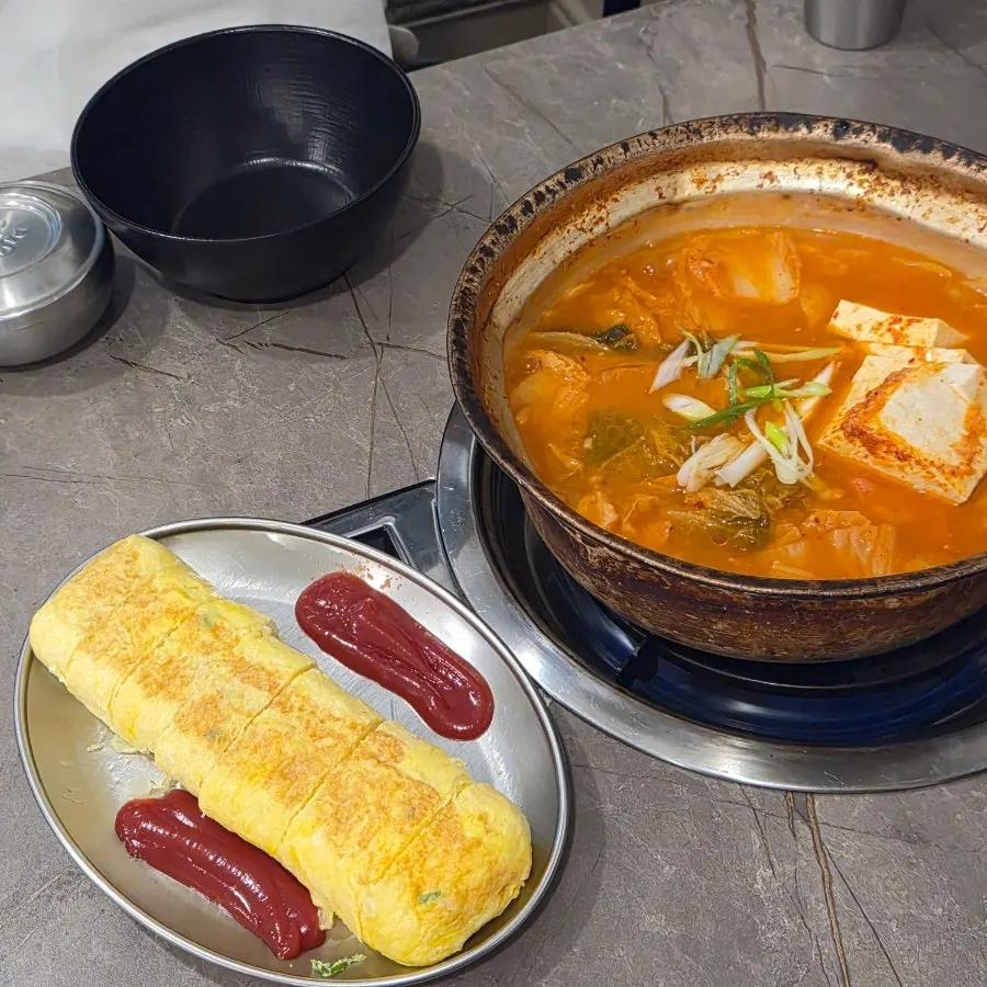 A pot of Korean fresh pork kimchi jjigae