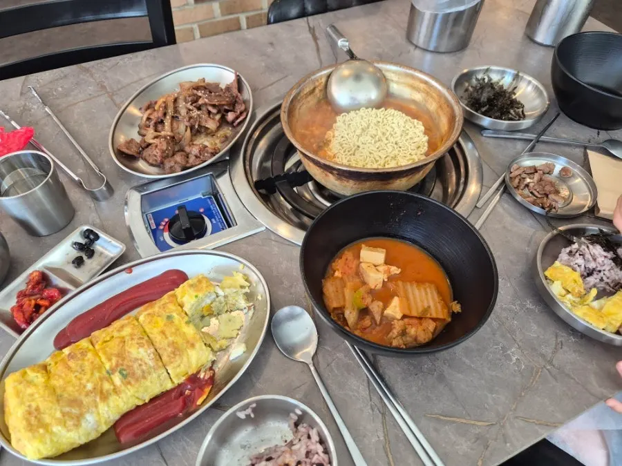 Generous lunch spread shared by mother and daughter