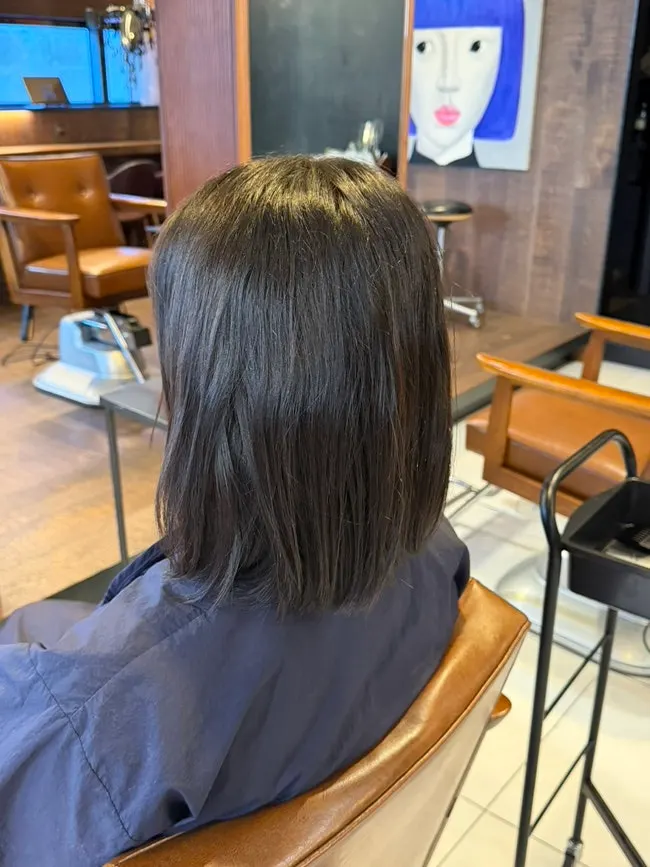 Frizzy curly bob before the magic setting perm