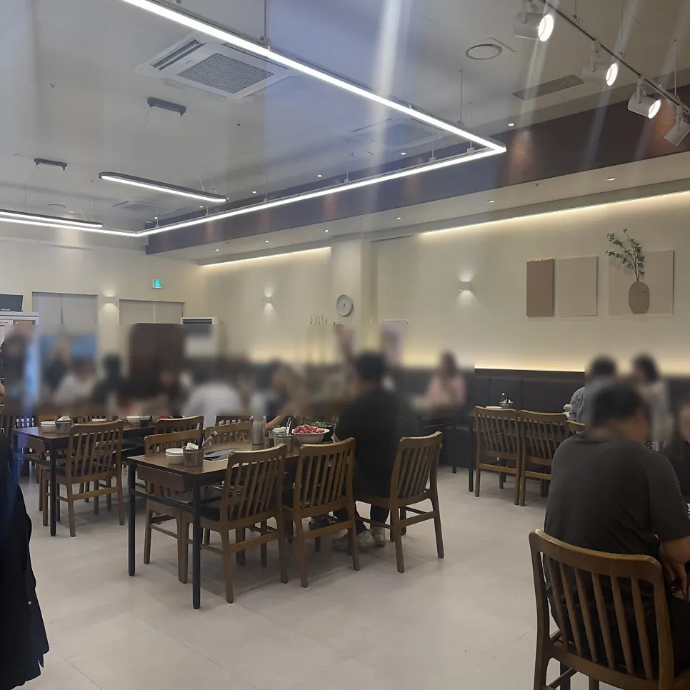 Business hours notice at Deungchon Shabu Kalguksu Gran Passage Branch