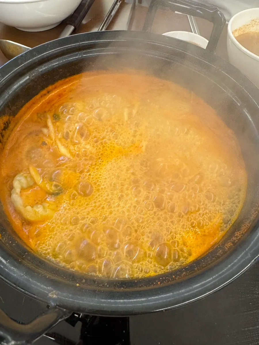 Kalguksu noodles cooked in the spicy broth