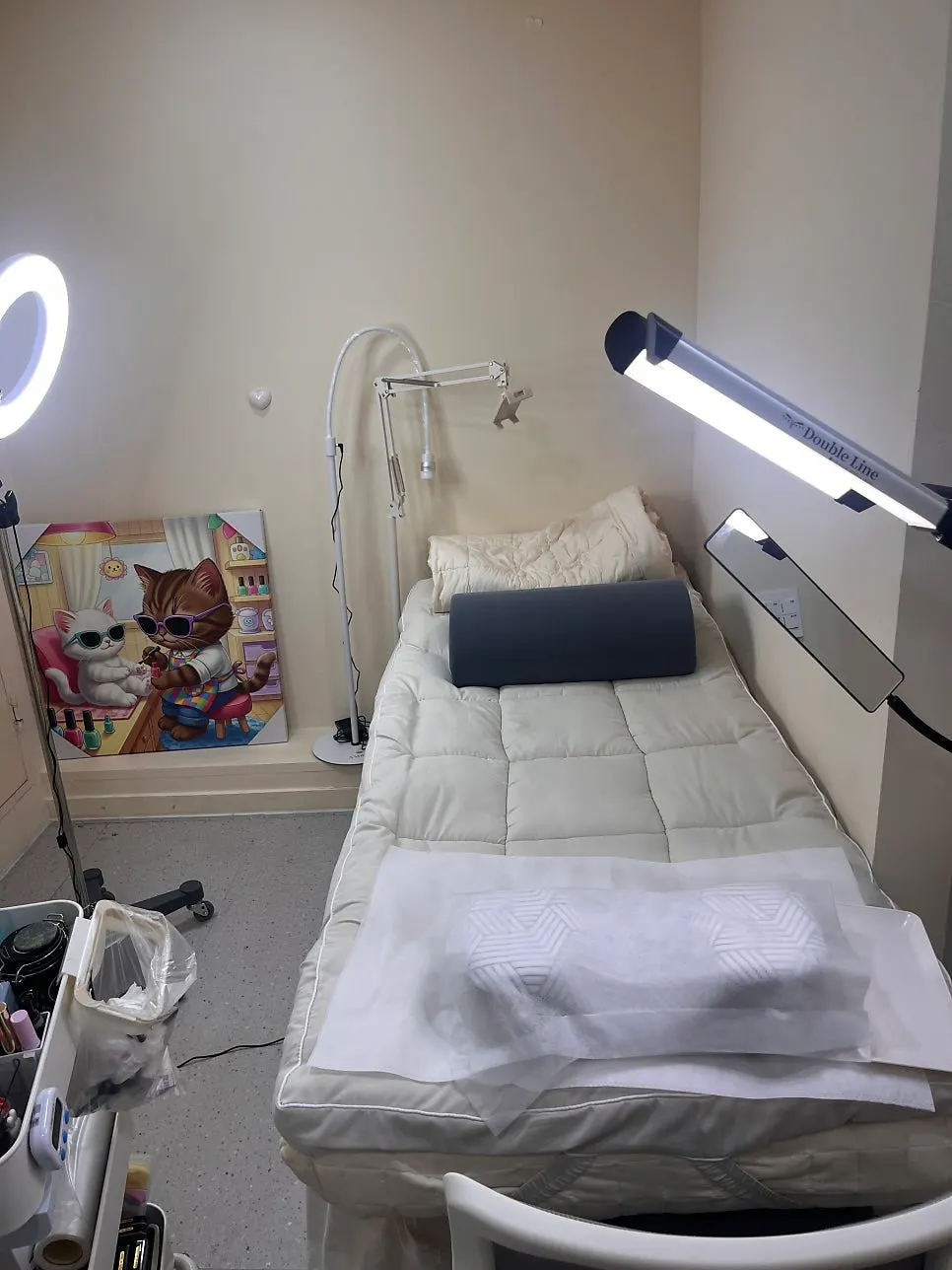 Treatment space with bed and lighting set up for the lash lift