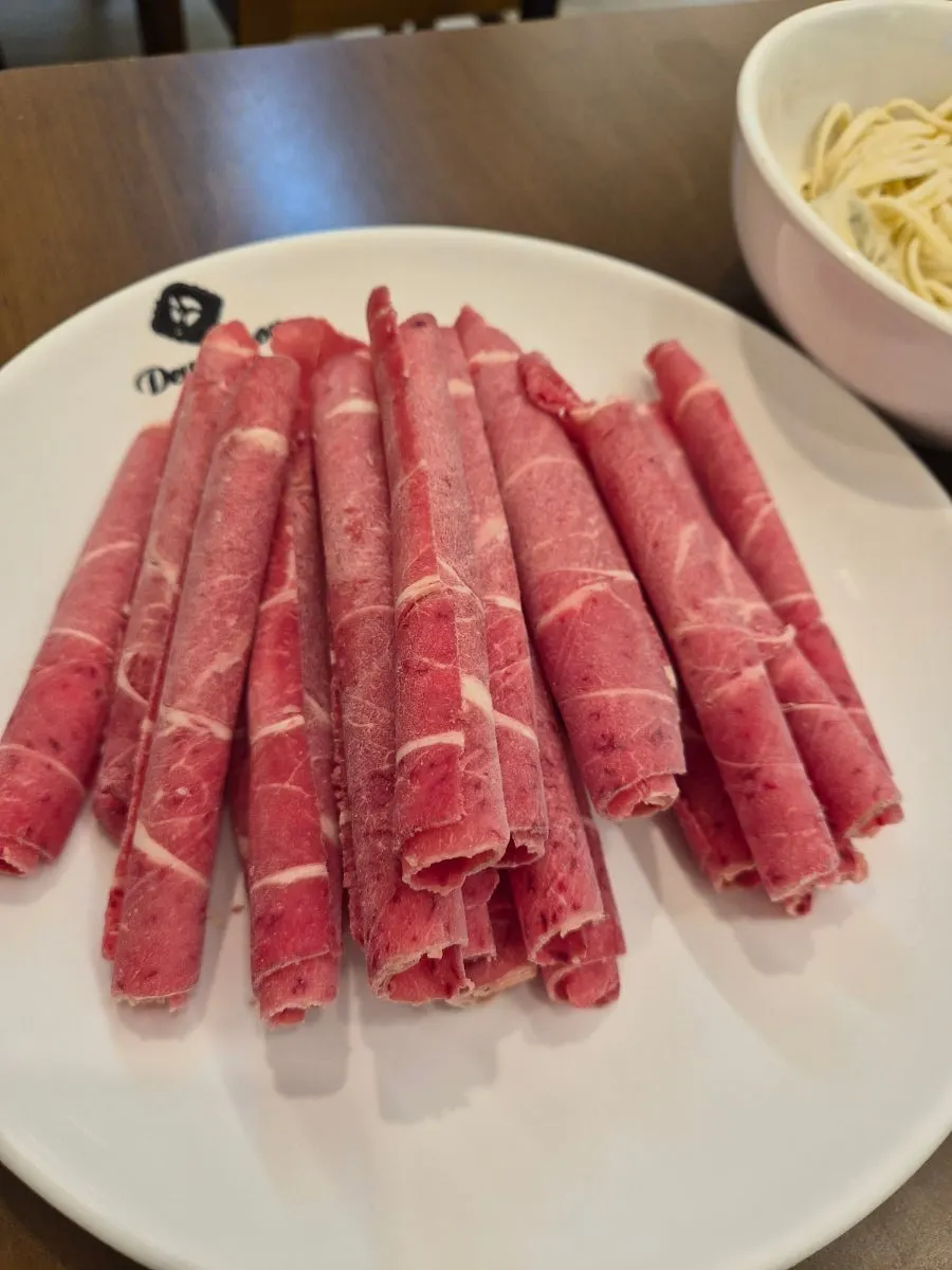 Table spread for spicy shabu for two with beef add-on