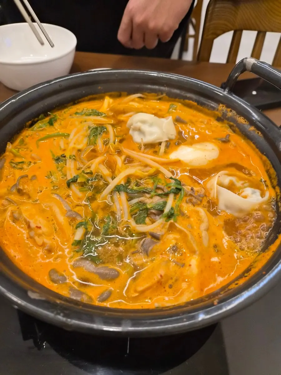 Spicy shabu kalguksu pot starting to boil