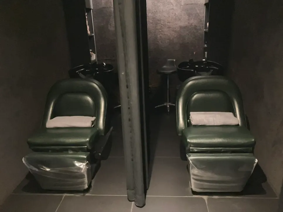 Shampoo area divided into private and two-person rooms