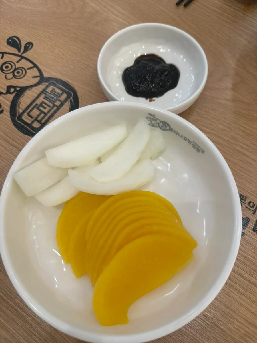 Plate of raw onion brought over with chunjang (black bean paste)