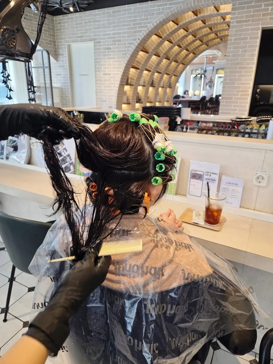 Haircut process before the hippy perm