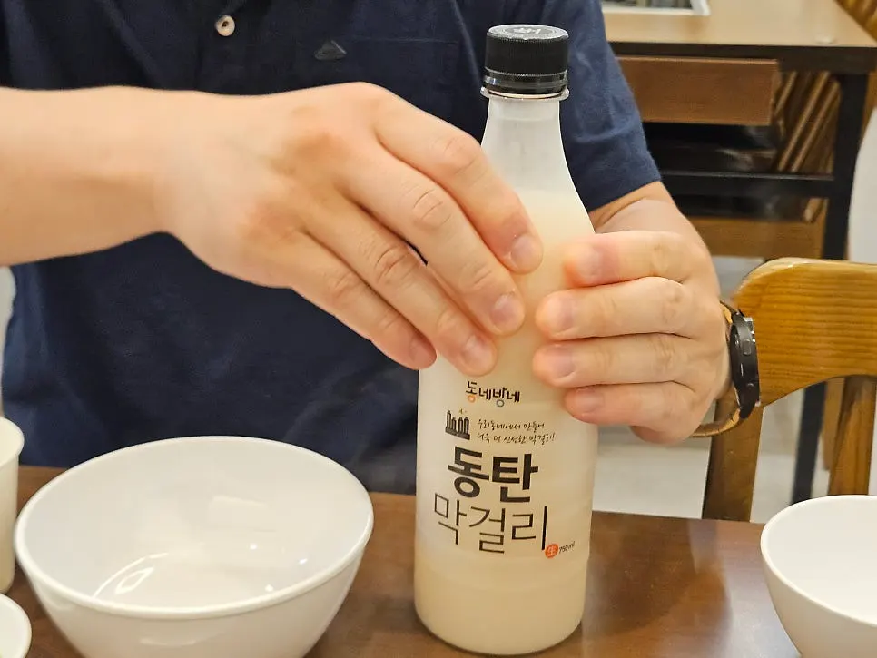 Dongtan makgeolli bottle and glass on the table