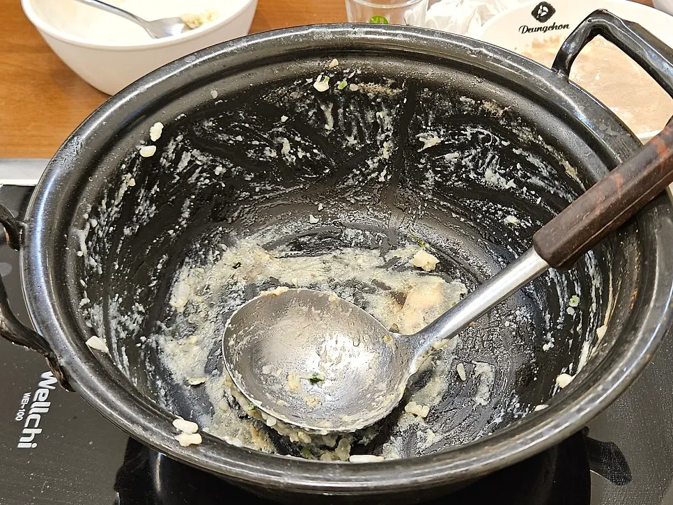 The clear mushroom kalguksu meal finished with porridge