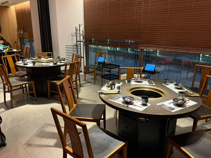 Table for group seating further inside the restaurant