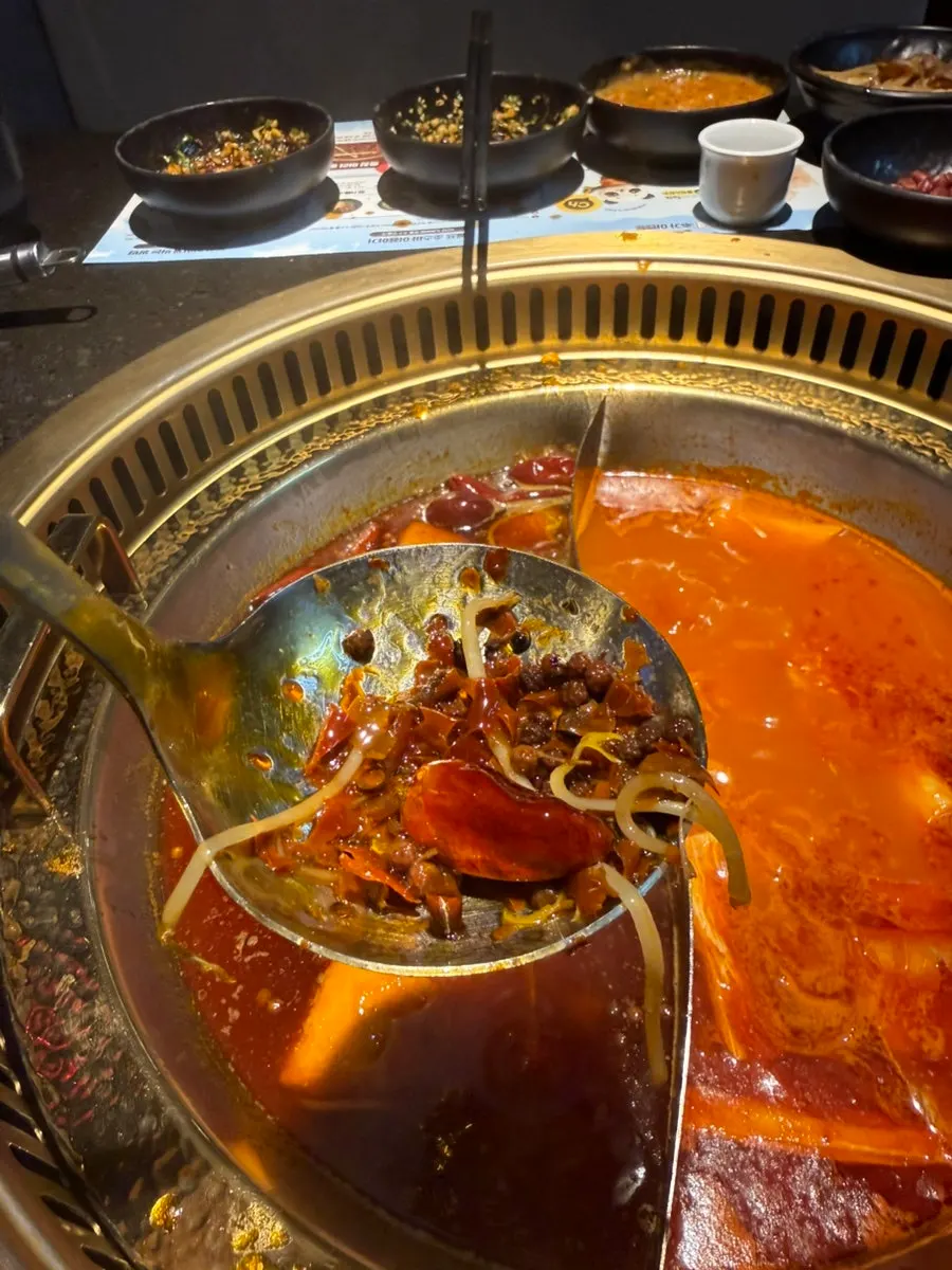 Half-and-half hotpot pot starting to boil