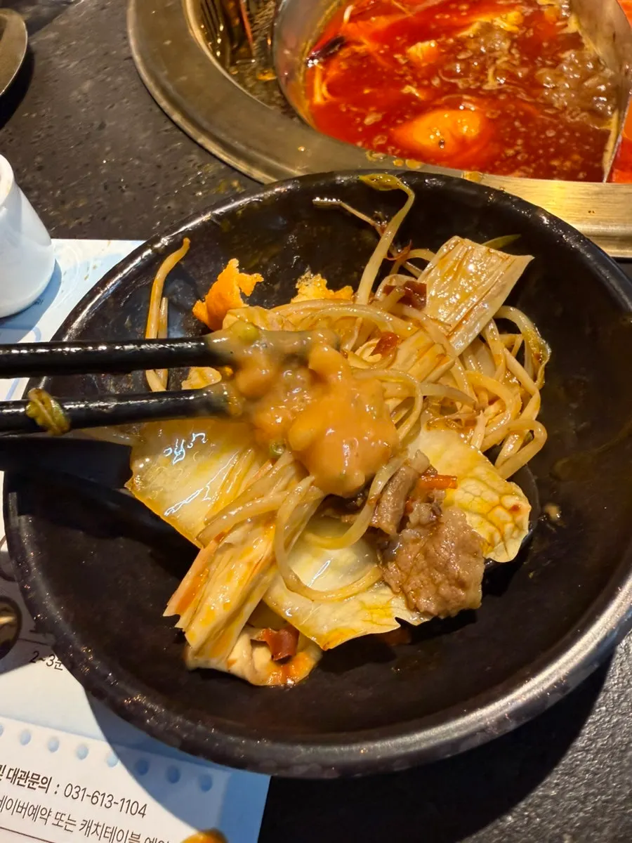 Soft tofu soaked in red broth