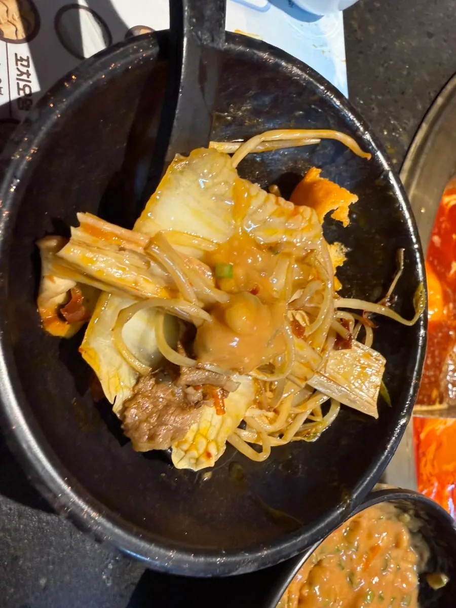 Beancurd sticks and tofu cooking in the broth