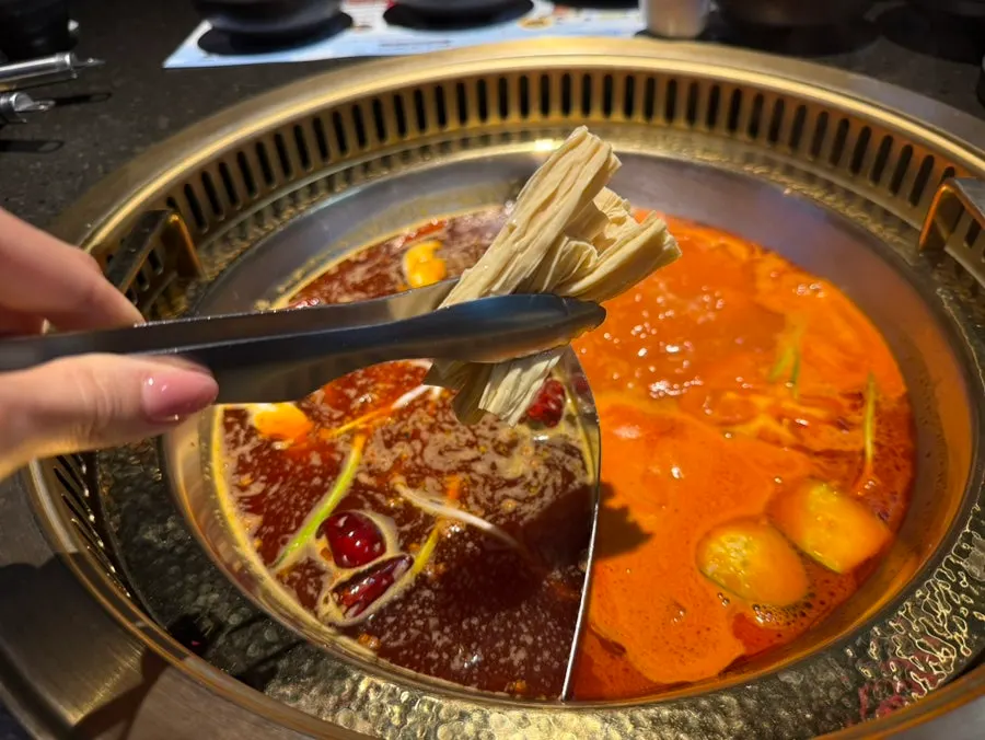 Hotpot ingredients briefly cooked and lifted out