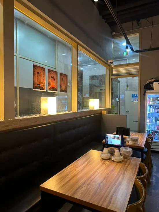Warmly lit interior of Jusangnakwon hall