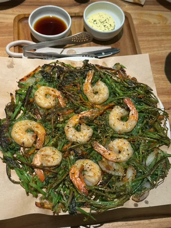 Crispy shrimp minari pancake topped with shrimp