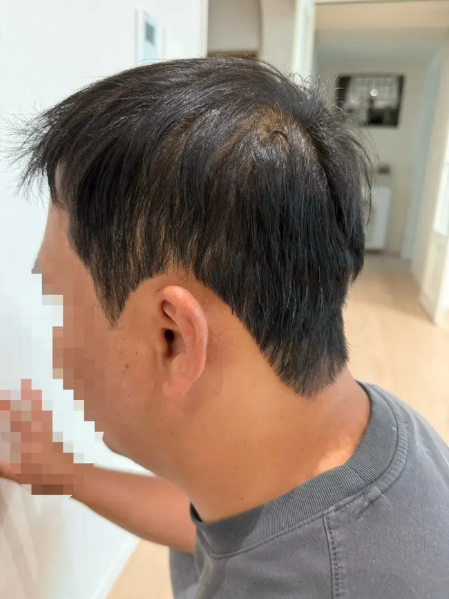 다운펌 후 앞머리가 정리된 모습