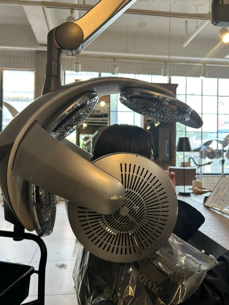 Protein care being applied to the hair ends