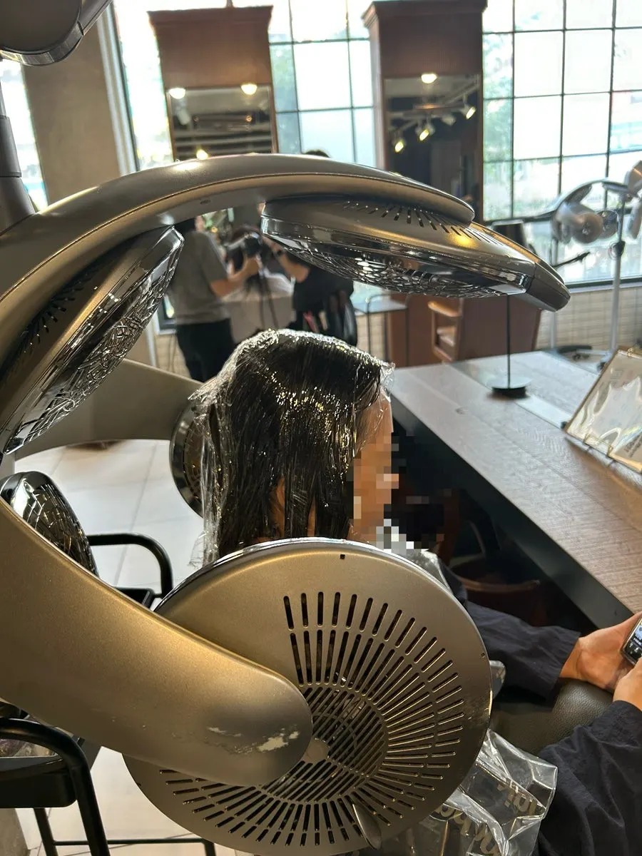 Treatment in progress at the salon chair