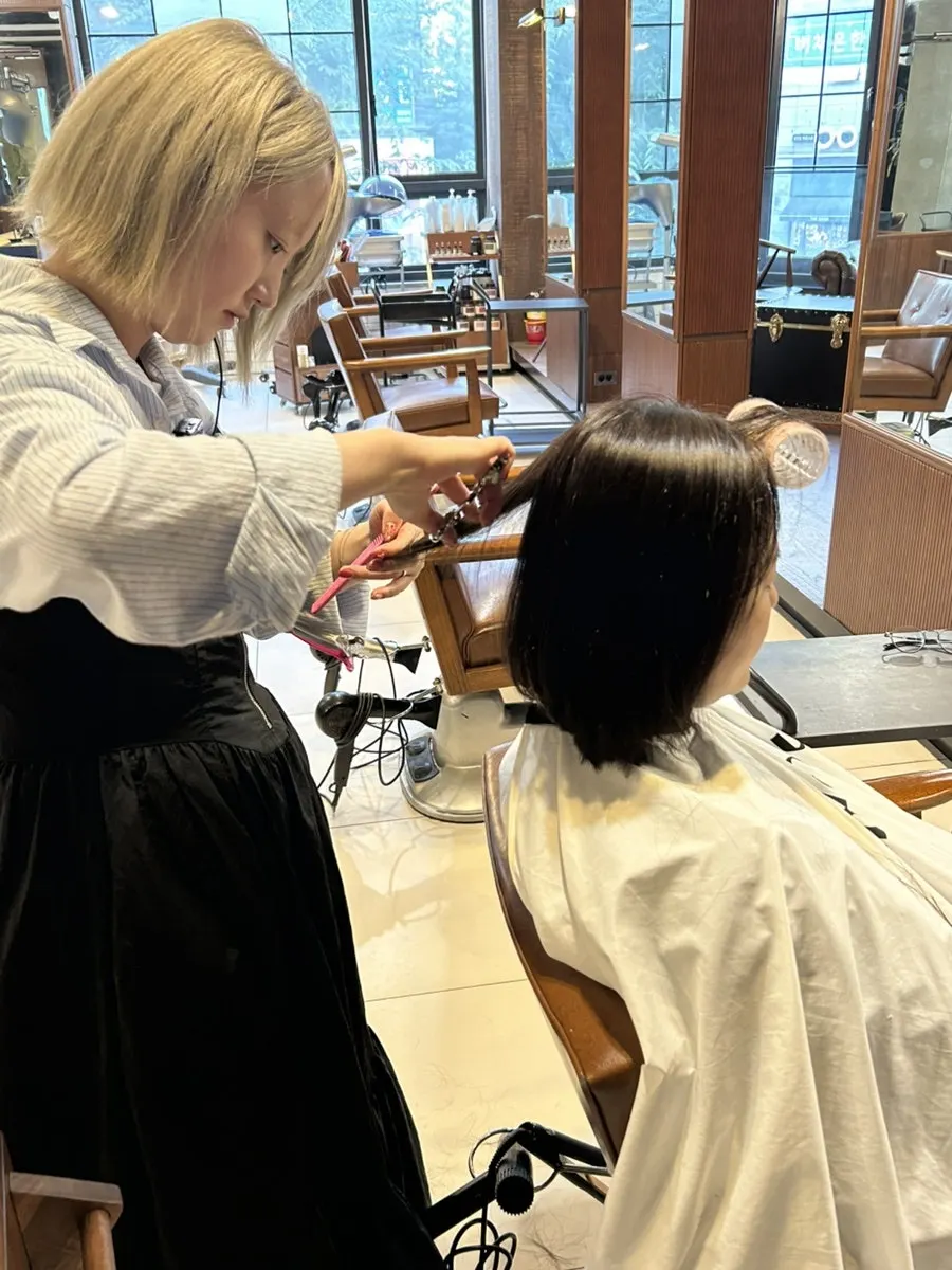 After shot of the layered short-hair volume magic result