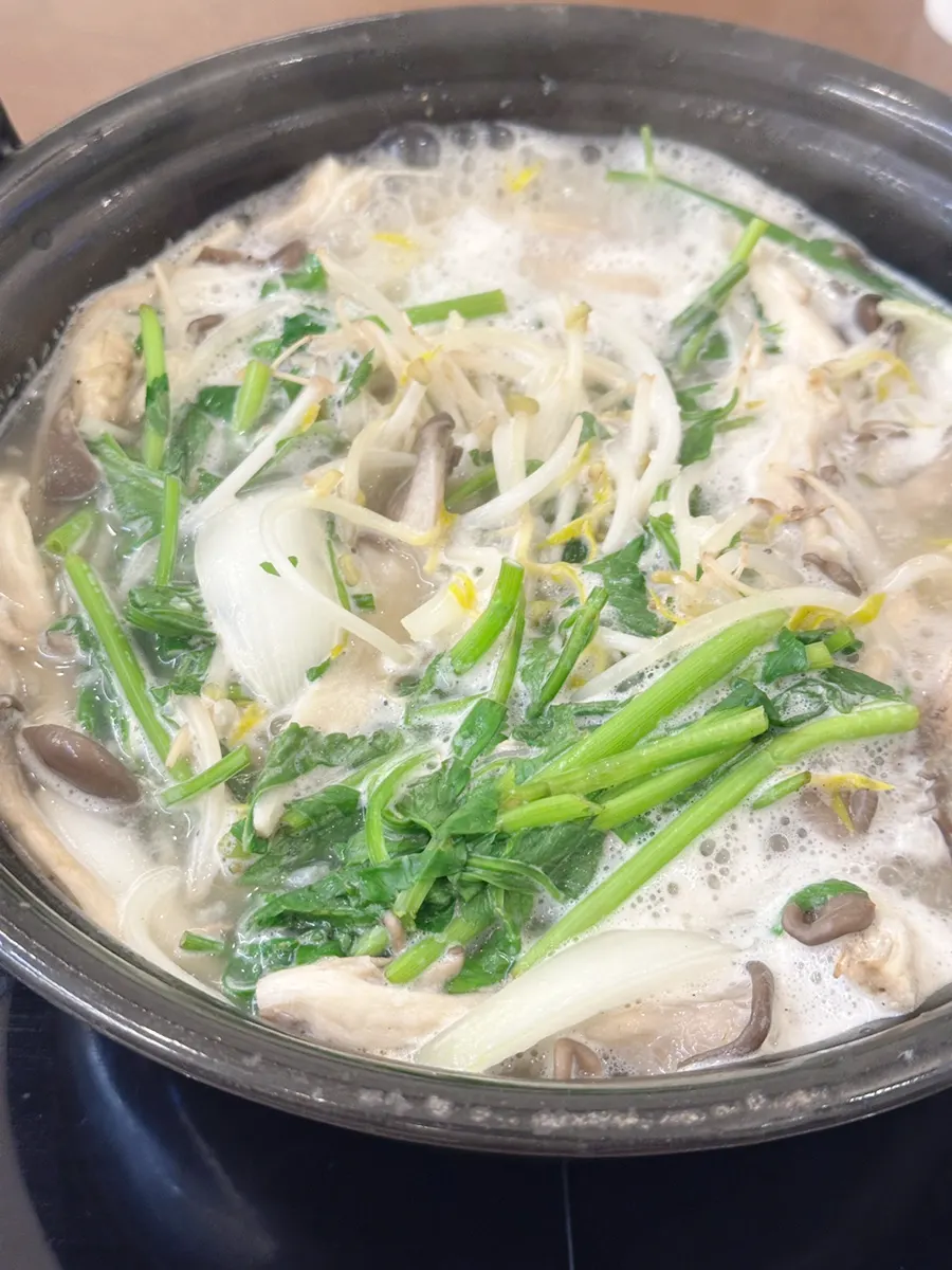A small plate of shabu-shabu meat scooped out