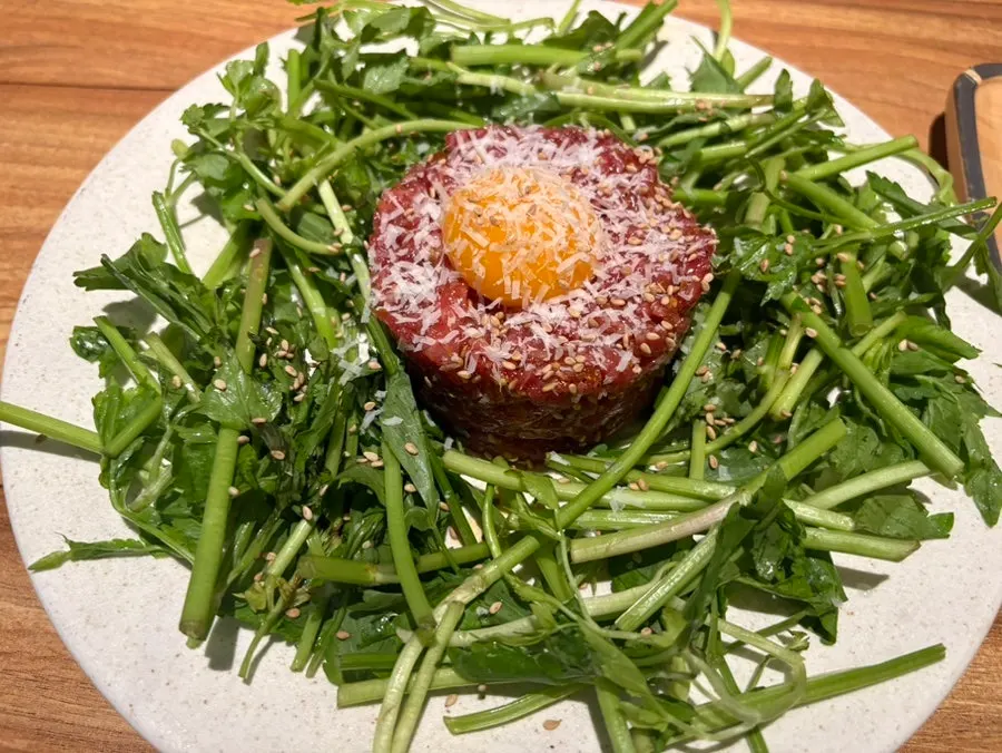 A plate of hanwoo minari beef tartare at Jusangnakwon