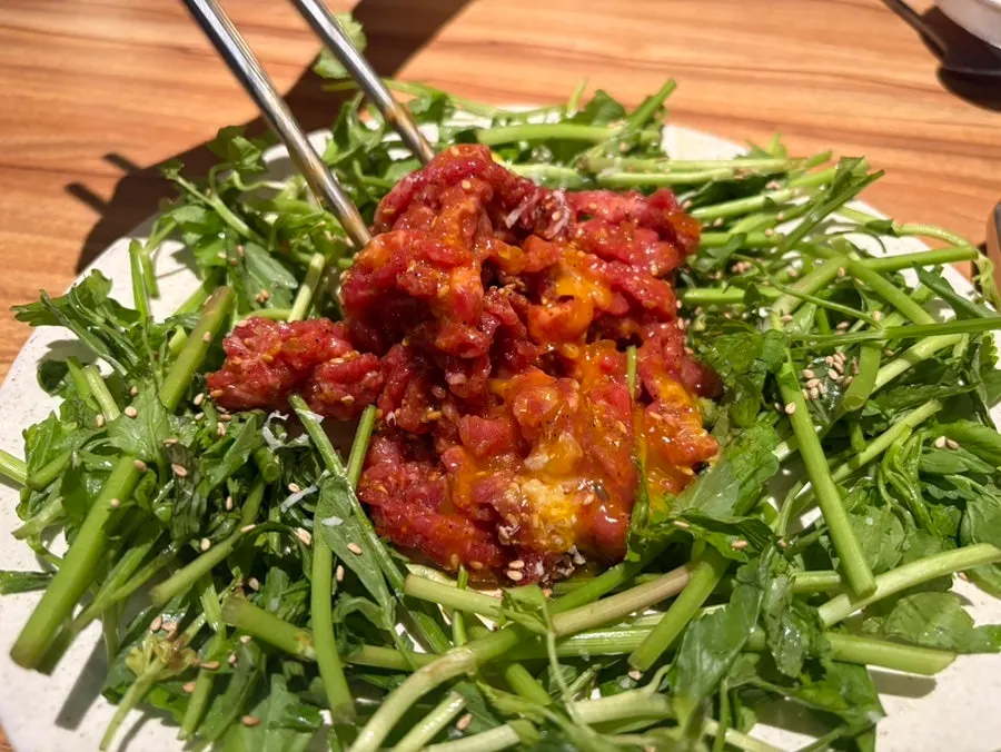 A chopstick bite of hanwoo minari beef tartare