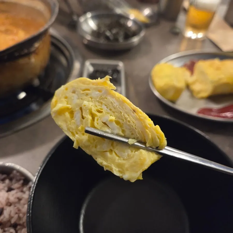The kimchi jjigae broth turned rich after long simmering