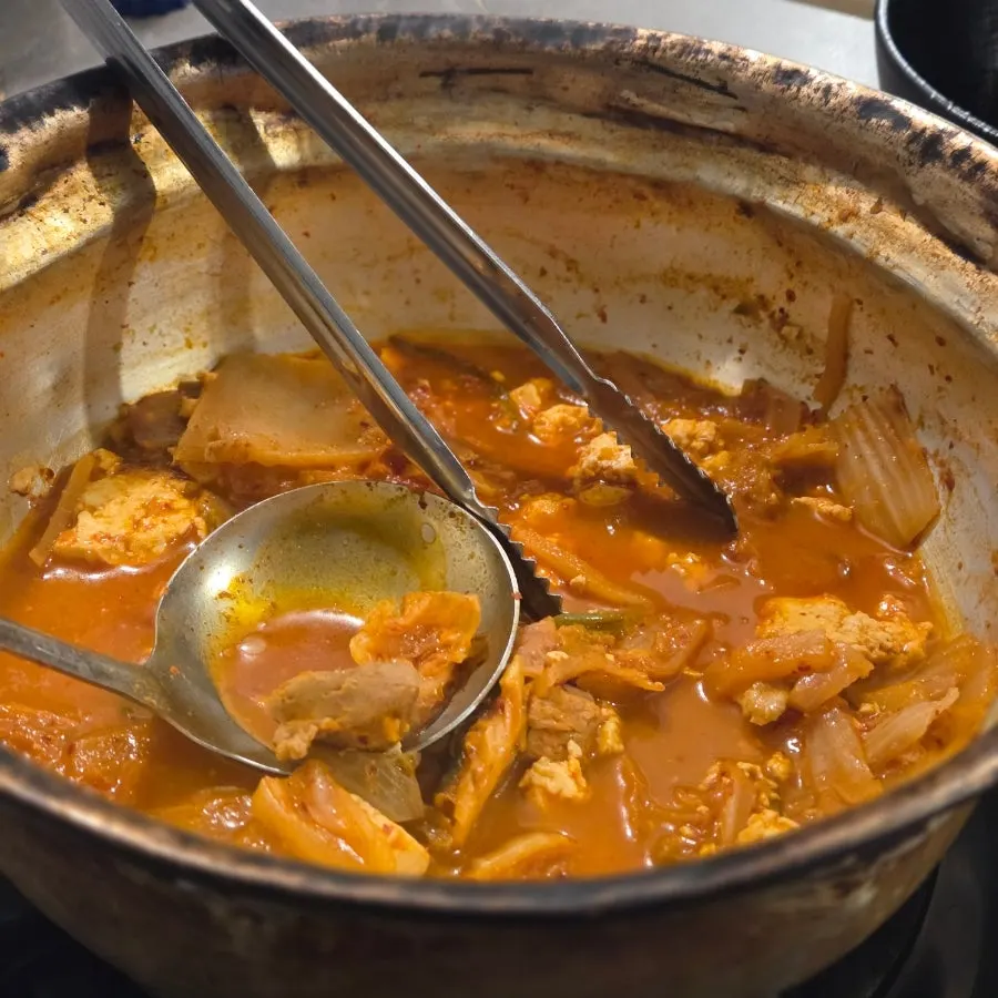 Rice mixed into the thickly reduced broth