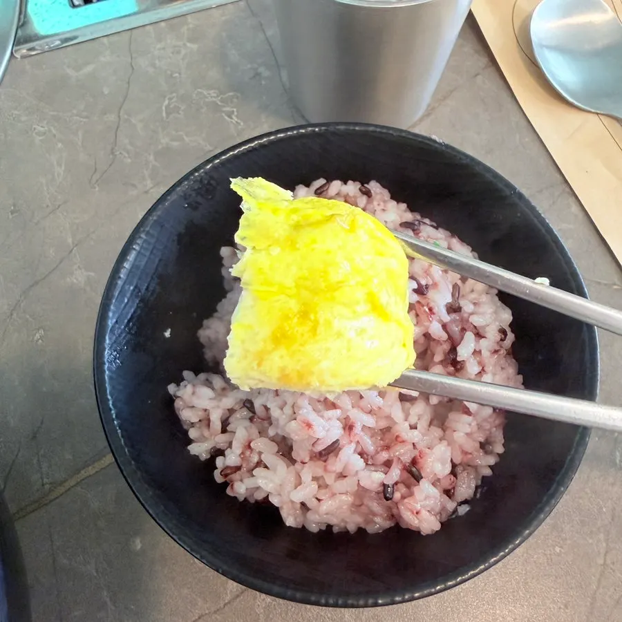 Rolled omelet eaten with rice