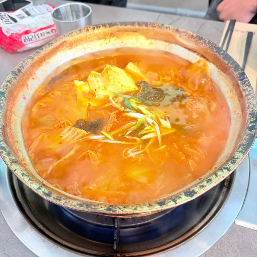Kimchi jjigae set for two in a large bowl