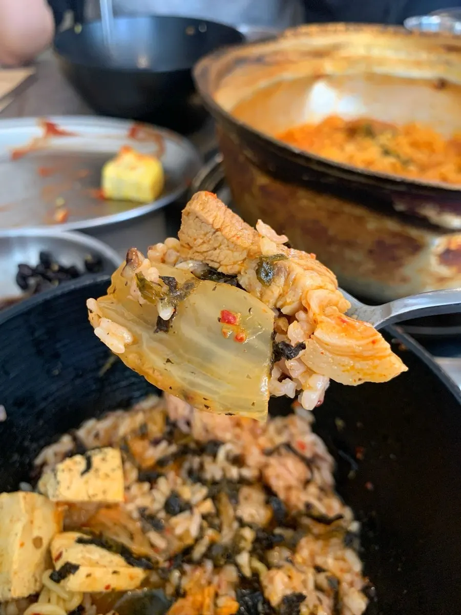 Kimchi jjigae boiling with the tofu add-on