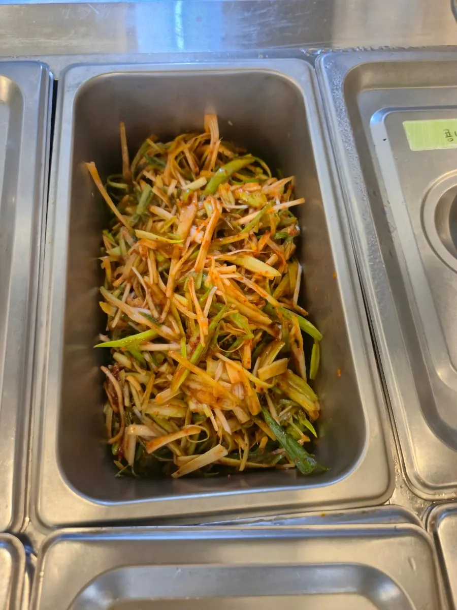Braised black beans at the self-serve bar