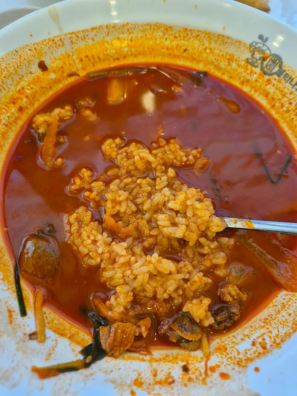 Spicy broth loaded with cockles