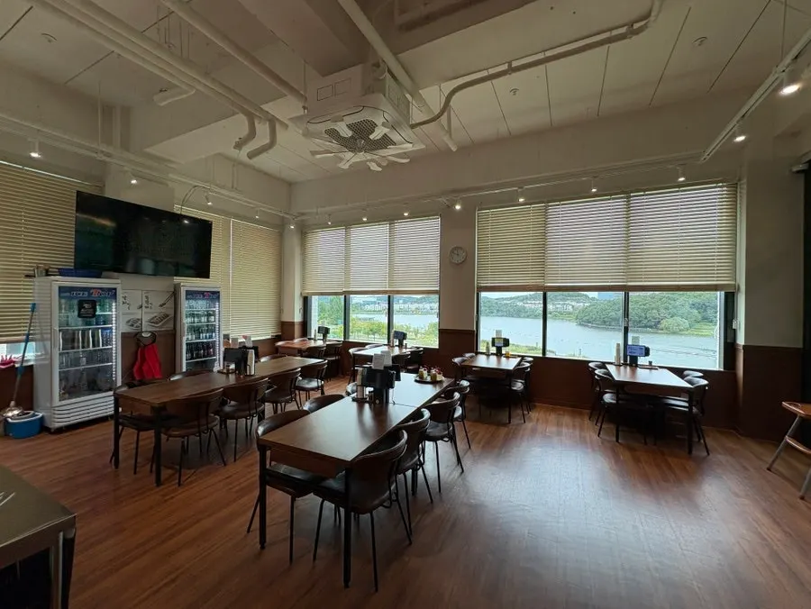 Dining room seating with generous table spacing