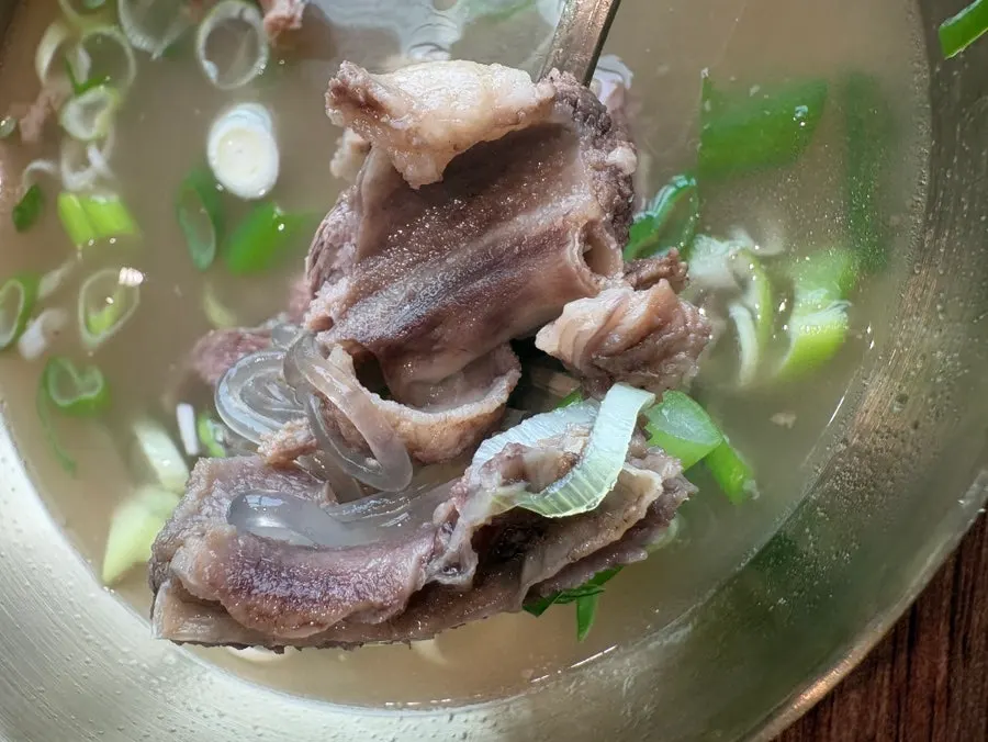 Close-up of galbitang broth and short rib meat