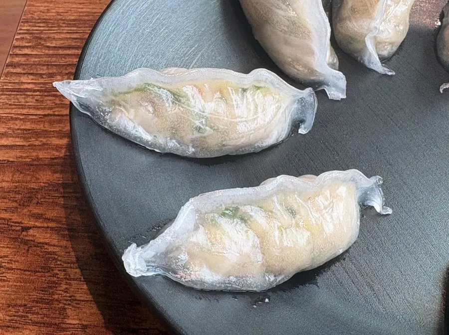 Cross-section of octopus mandu with translucent wrapper