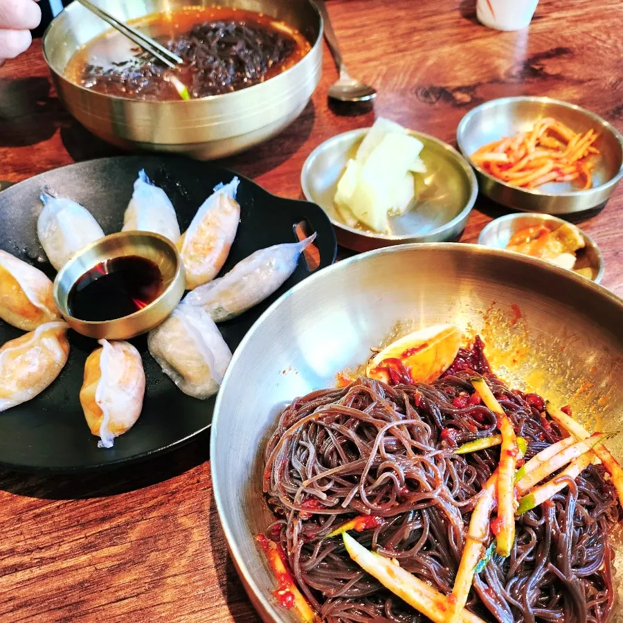 Ordered naengmyeon and dumpling dishes