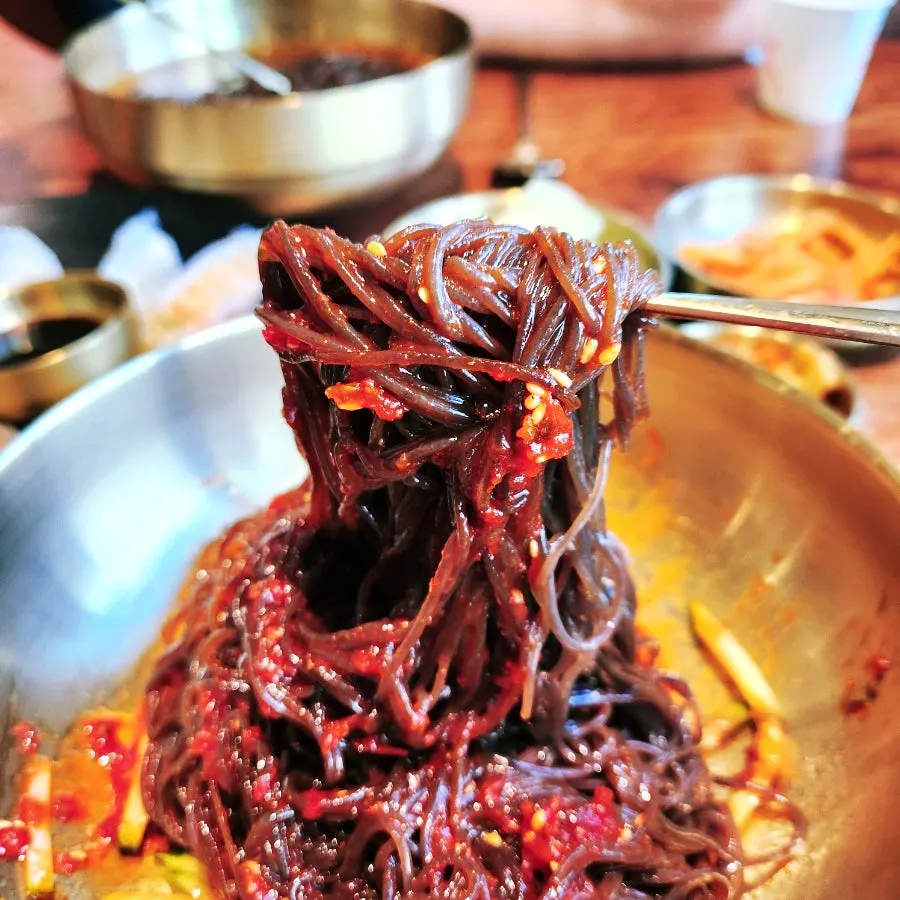 Bibim naengmyeon paired with pickled radish