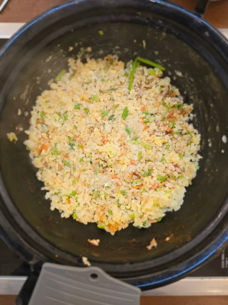 Fried rice stir-fried in the kitchen and brought to the table