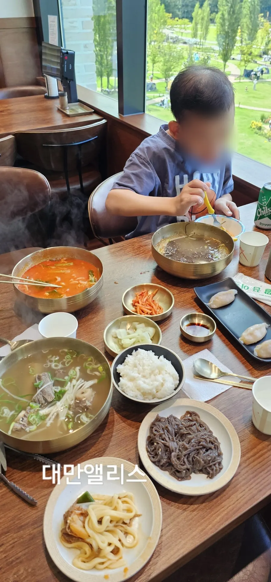 Table spread with half order of octopus mandu
