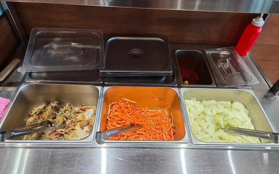 Self-serve bar with julienned radish and diced radish kimchi