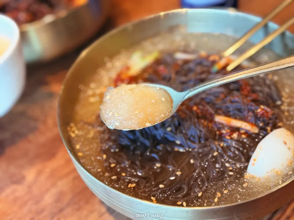 Mul-naengmyeon broth with slush ice floating in it