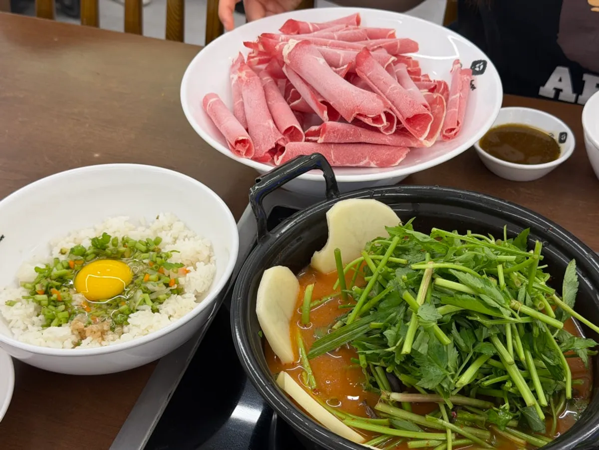Table set with spicy shabu kalguksu for two