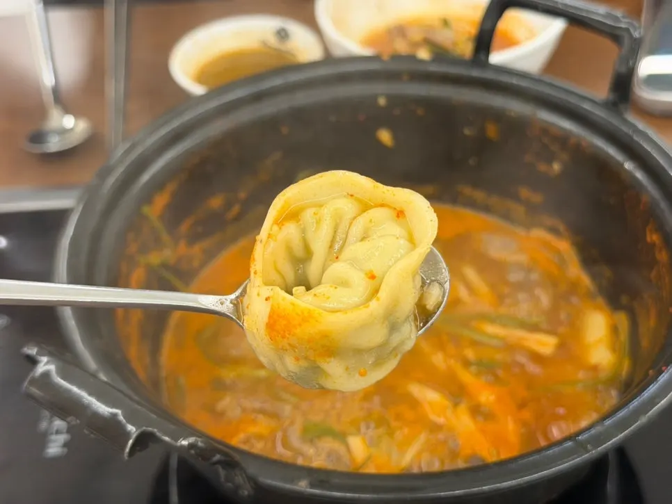 Dumplings added to the broth