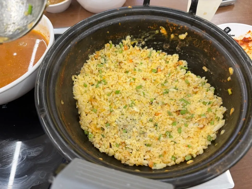 Fluffy fried rice stir-fried at the table