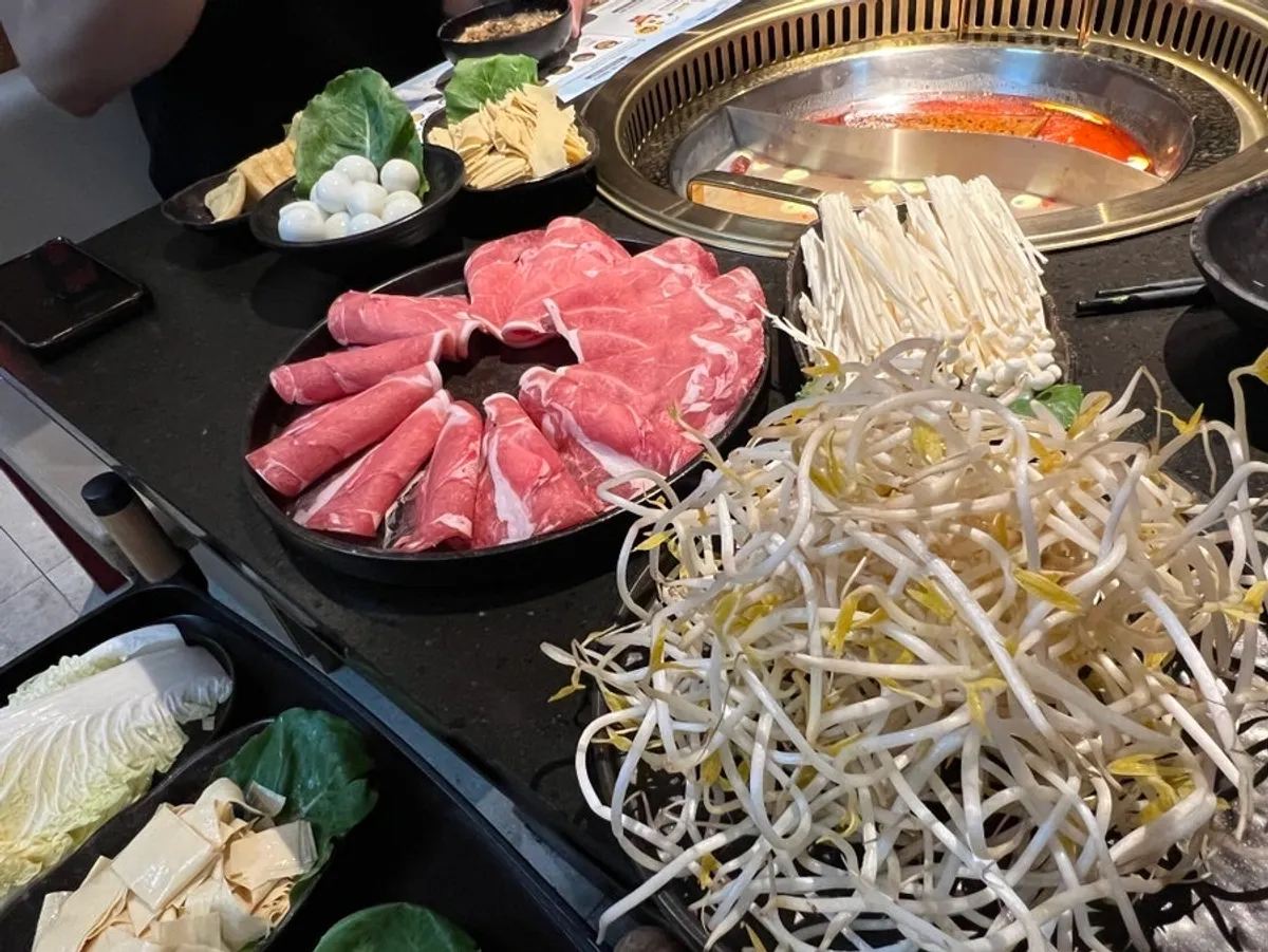 Full hotpot spread at Lao Chongqing Hotpot near Dongtan's north plaza