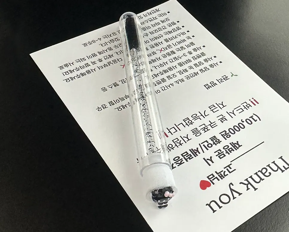 Aftercare coupon and lash brush received after the treatment